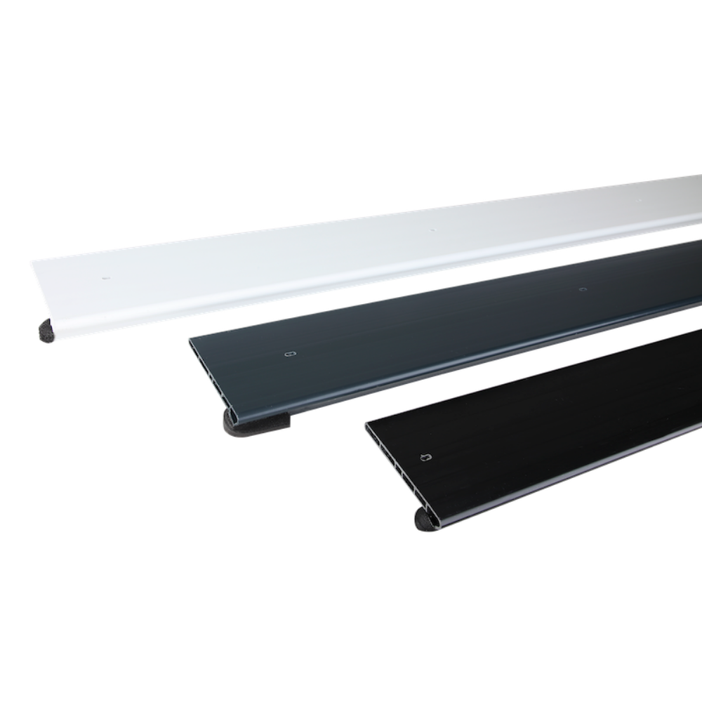 Three lengths of RubbaTrim Edge appearing almost horizontally: white at the top, then anthracite, then black.